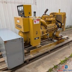 Full side view of Katolight 35kW open skid NG generator with remote control cabinet